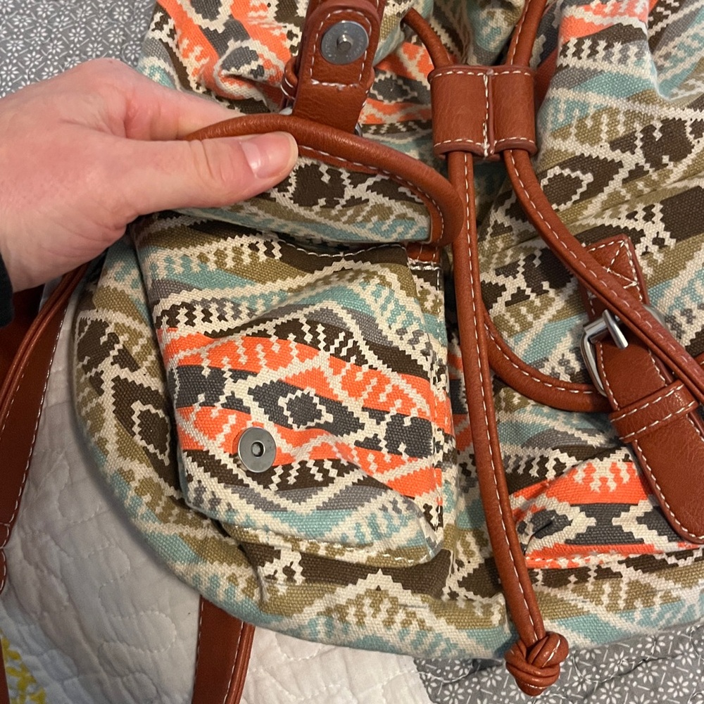 Patterned Backpack With Brown Accents - image 4